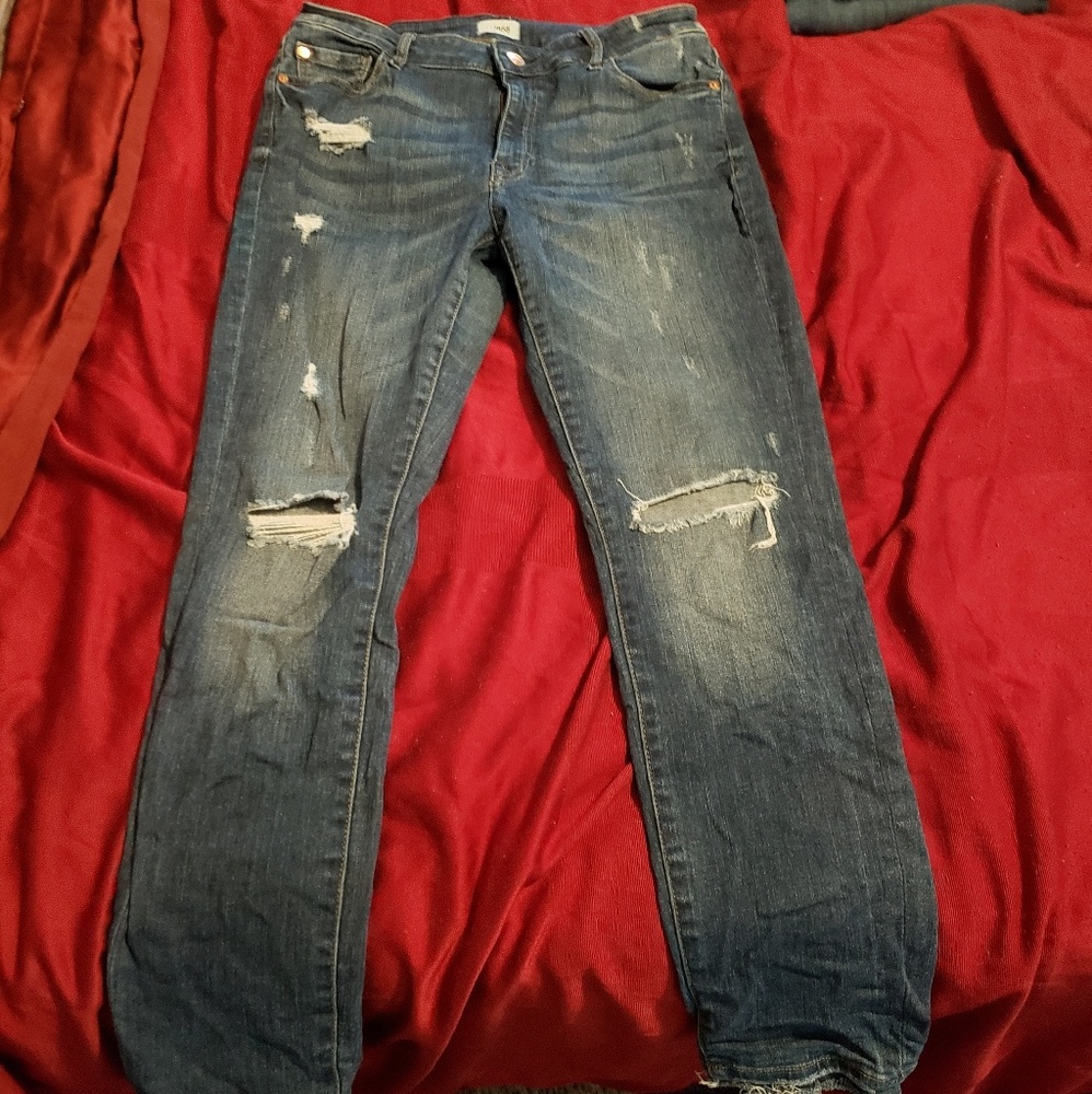 Distressed darker wash skinny jeans